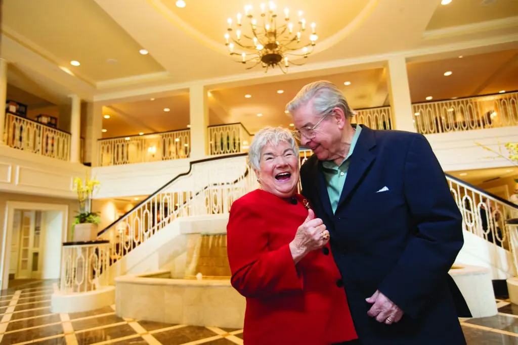 Elaine and Bob Harris clearly enjoying their residency at The Buckingham, Houston senior living community.  