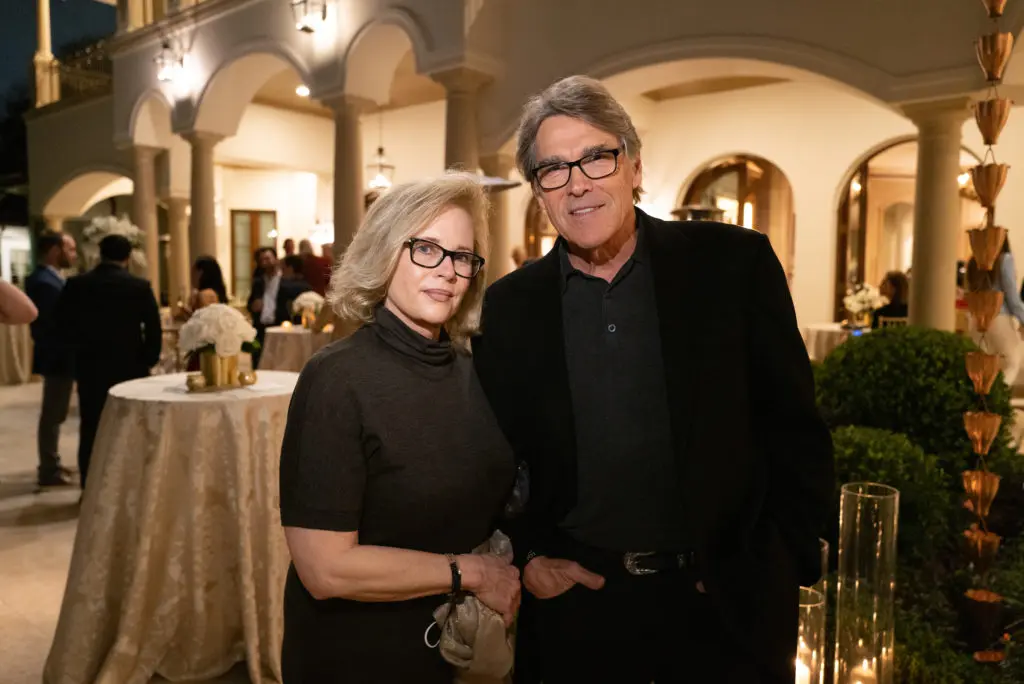 Anita and former Governor Rick Perry, Tony Buzbee's best man, join the engagement party in a Memorial area swankienda. 