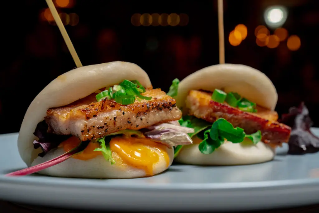 Pork belly buns are a must-try shareable dish at Anju. (Courtesy)