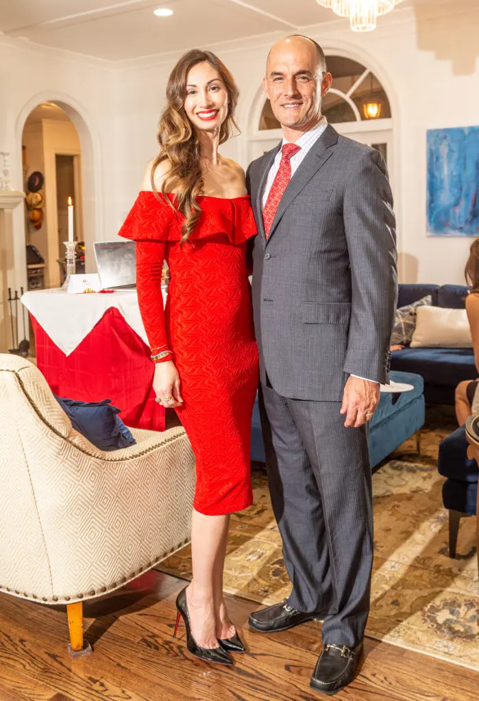 April and Dr. Jorge Salazar, pediatric cardio-thoracic surgeon at Memorial Hermann, tune into the American Heart Association virtual gala. (Photo by PWL Studio)