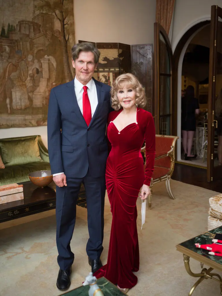 Beau King escorts his mother, Joanne King Herring, at the engagement party of Frances Moody and Tony Buzbee.