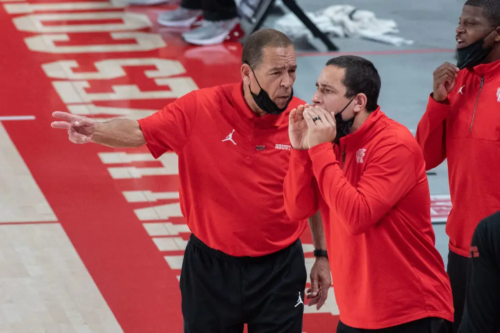 Kelvin Sampson and Kellen Sampson are key figures in one of college basketball's great program resurrections. (Photo by F. Carter Smith)