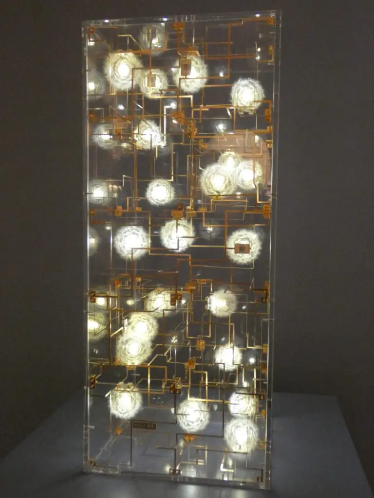 DRIFT, Fragile Future 3.14, designed 2015, made 2018, dandelion seed, phosphorus bronze, LED, and Perspex. (Photo by Tarra Gaines)