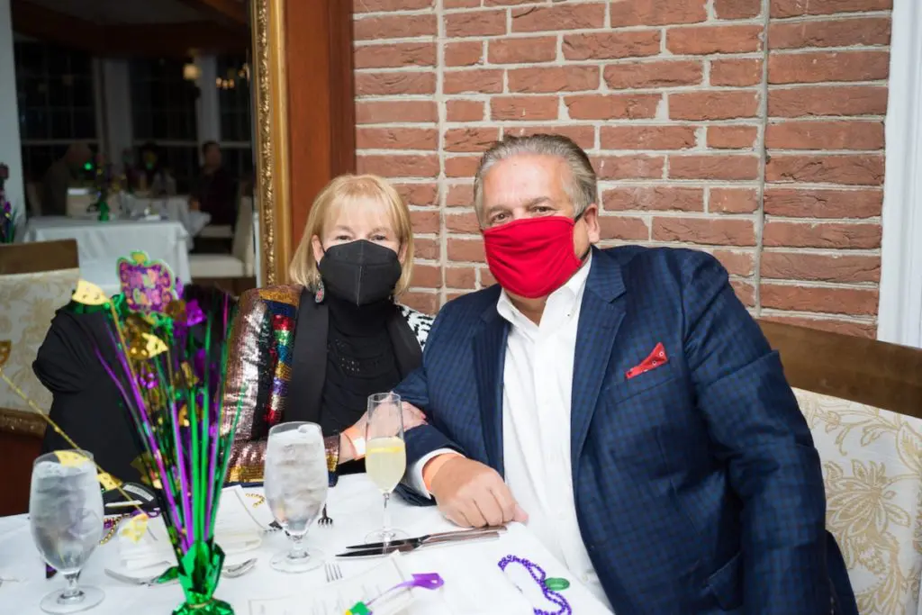 Barbara & Mike Reyna at The Houstonian Mardi Gras bash held in all three dining rooms of the historic Manor House. (Photo by Daniel Ortiz)