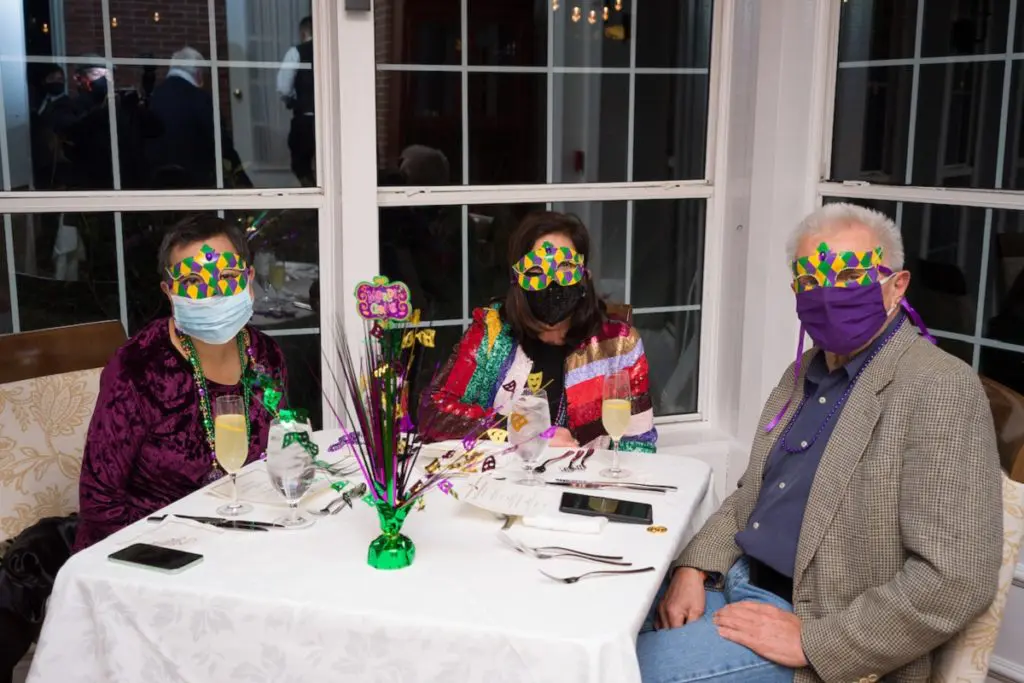 Jean Wilson, Rosanne Kaufmann, Ron Juwa at The Houstonian Mardi Gras bash held in all three dining rooms of the historic Manor House. (Photo by Daniel Ortiz)