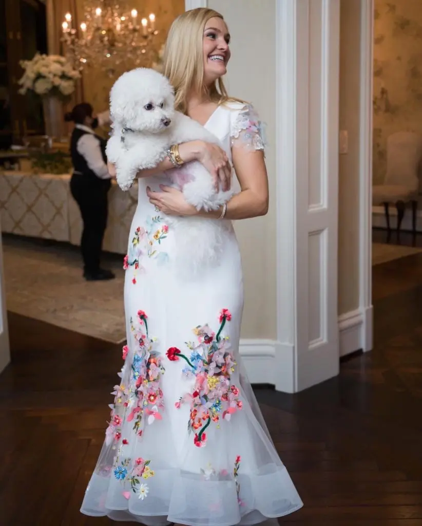 Frances Moody, pictured her with Nobel, designed her engagement party dress with Dallas-based designer Nardos Imam.