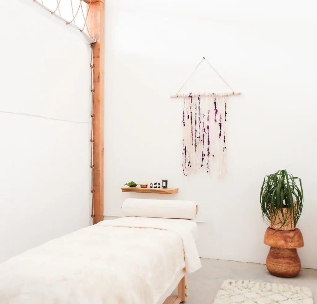 A simple, soothing aesthetic surrounds each heated massage table at The NOW, opening locations in Dallas, Houston, and Austin this year. 
