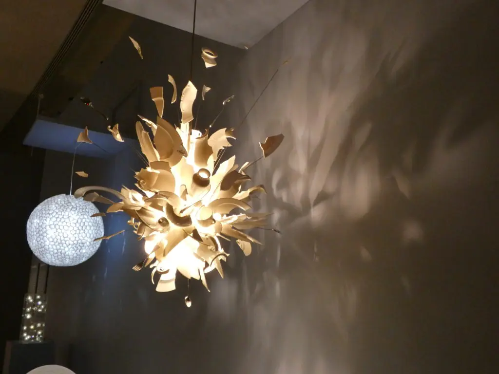 Porca Miseria! Hanging Lamp, designed by Ingo Maurer, manufactured by Ingo Maurer GmbH, designed 1994, made 2000, porcelain, metal, stainless steel, and halogen bulb. (Photo by Tarra Gaines)