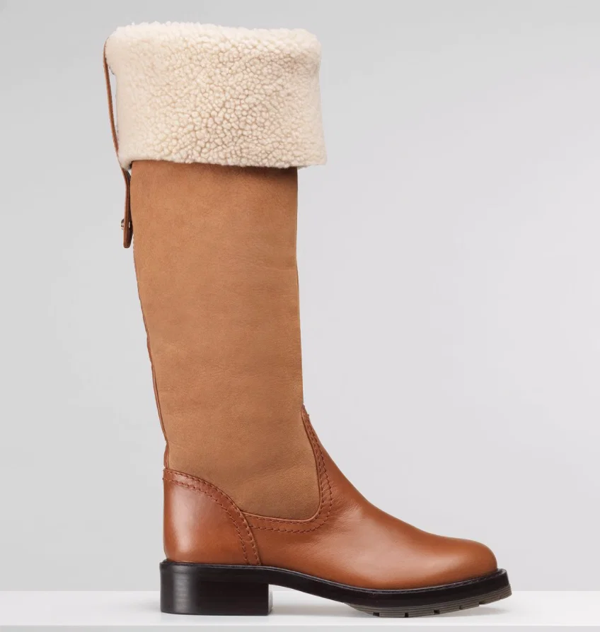 Chloé captures the essence of a riding boot in this sophisticated suede and leather winter boot, just right for the Texas deep freeze.