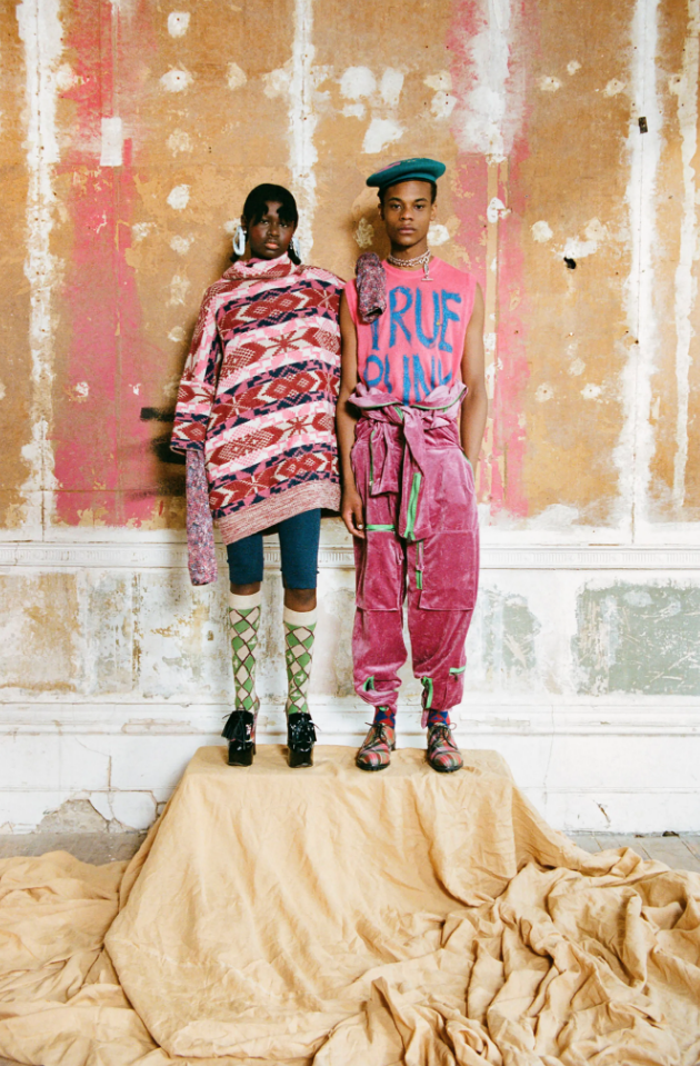 Vivienne Westwood True Punk T-shirt and velvet cargo pants, right, and oversized knit poncho, left. (Photo courtesy of Vivienne Westwood)