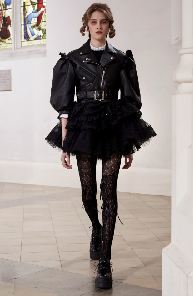 Simone Rocha black leather moto jacket with puff sleeves, tulle short skirt. (Photo courtesy of Simone Rocha)
