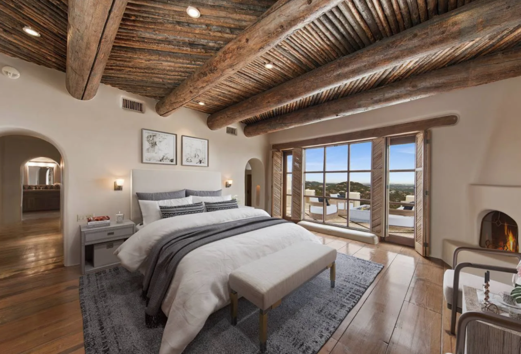 The second floor primary bedroom of the George Strait home in San Antonio has two complete master baths and separate walk-in closets.(Photo by LRES)