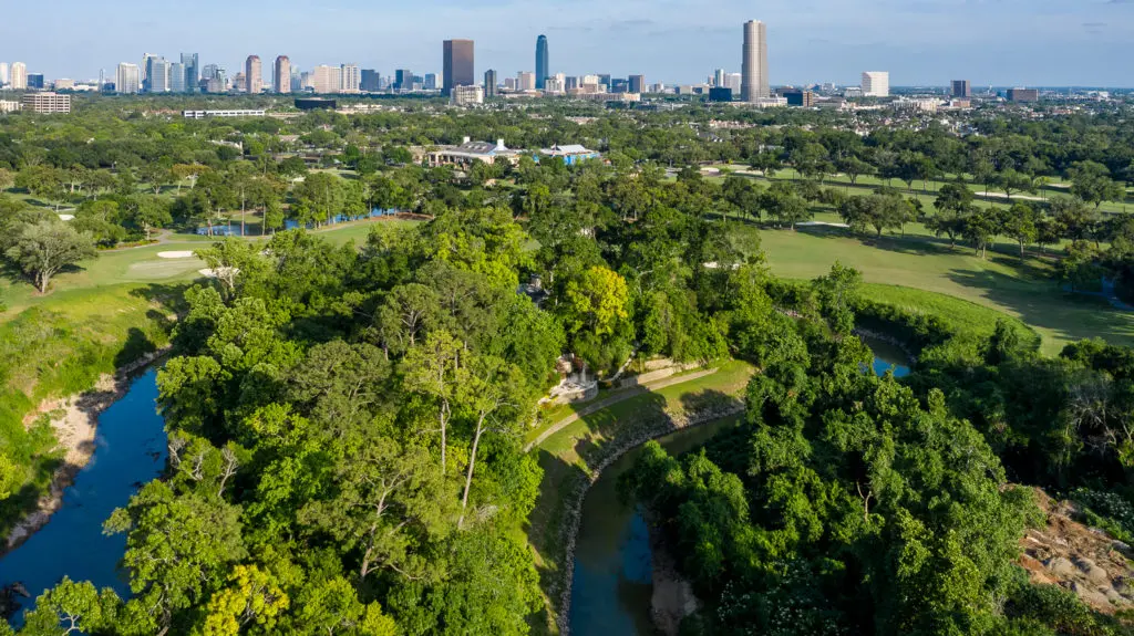 The home is surrounded by a horseshoe bend of the Buffalo Bayou.