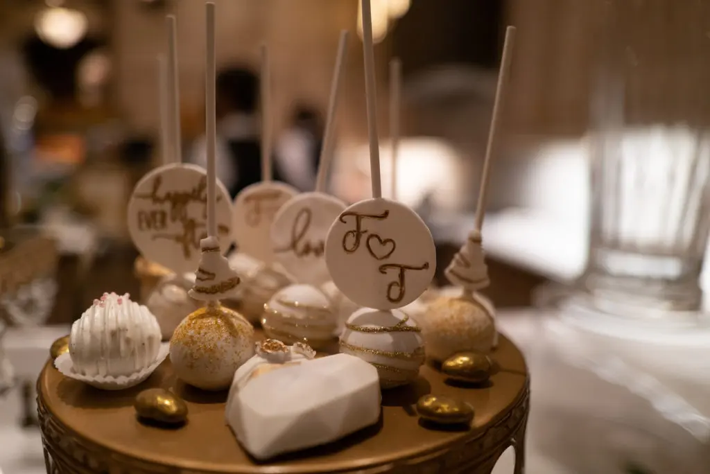 Kasby Kreations provided the gilded desserts for the engagement party honoring Tony Buzbee and Frances Moody.