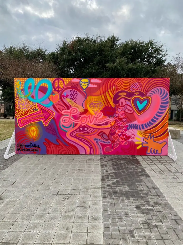 The February mural promotes Love & Kindness and the community is asked to interact with the wall by writing in what/who they love and want to spread kindness to.