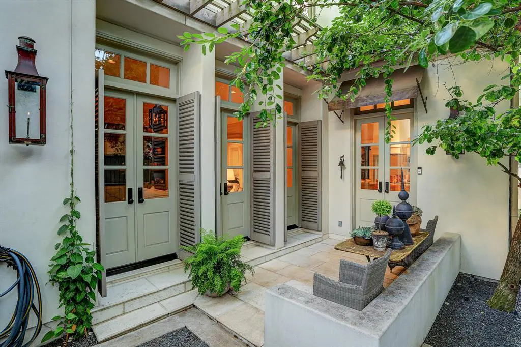 Shades of New Orleans in the design of the Afton Oaks dwelling at 3407 Banbury Place. 
