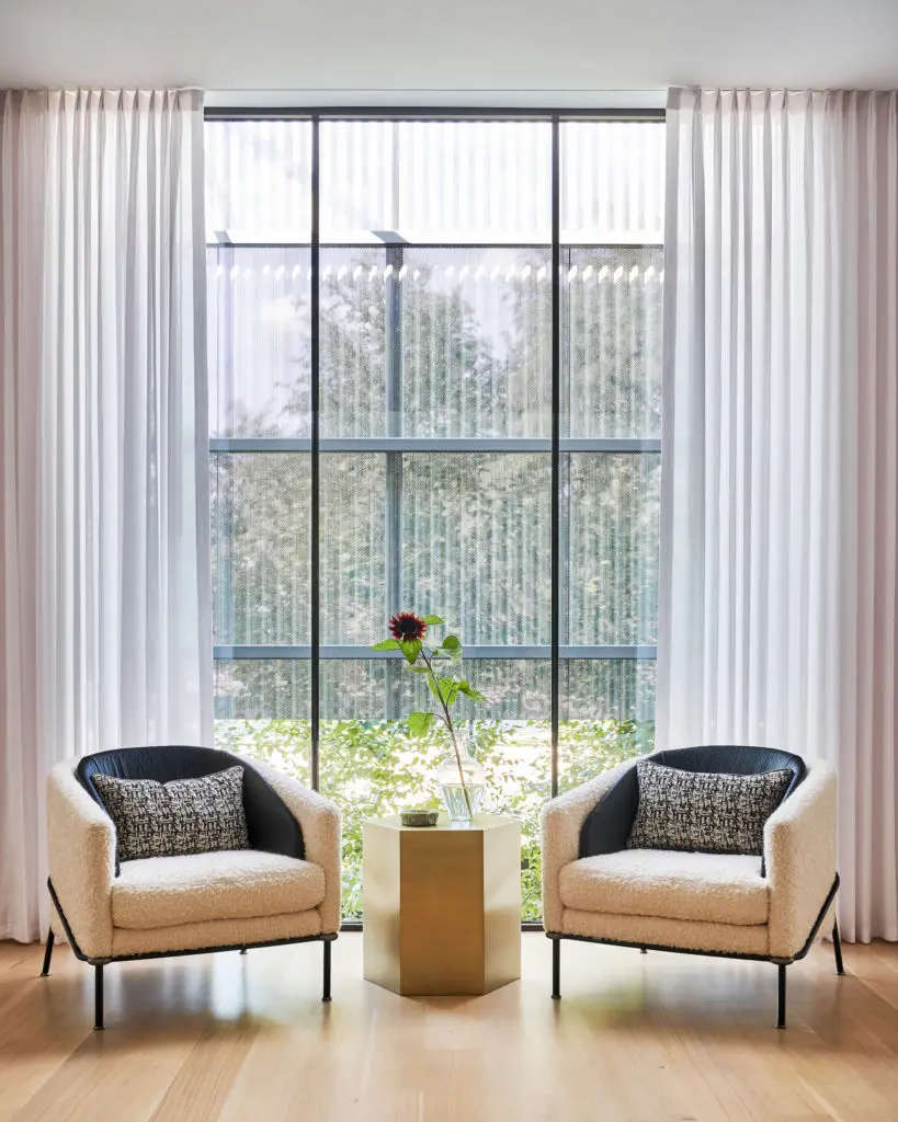 In the upstairs sitting area, Minotti chairs and Noir table. (Photo by Stephen Karlisch)