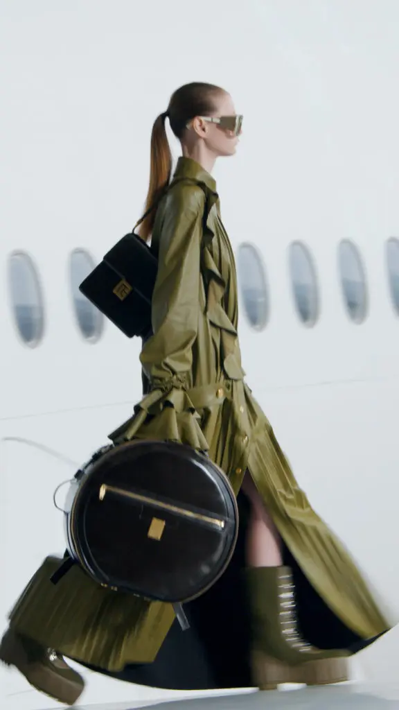 The high-flying Balmain fall collection features parachute dresses, lace-up boots, and structured luggage. (Photo courtesy of Balmain)