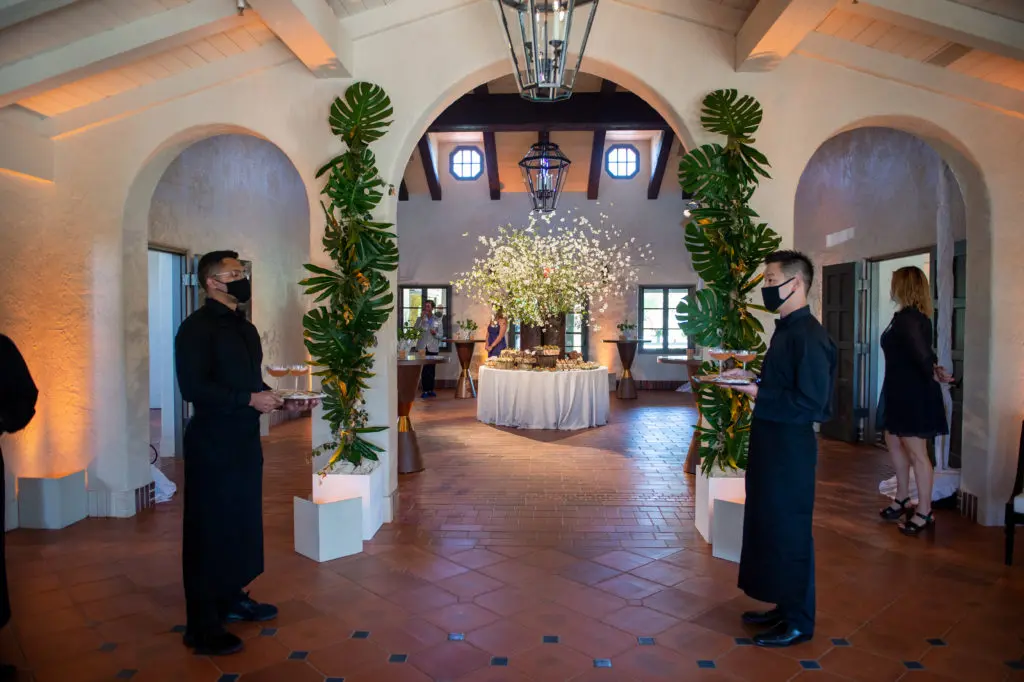 The foyer of Hermann Park Conservancy's Lott Hall is decorated as if for a wedding including the vast arrangement of dogwood. (Photo by Sarah Austin of Chris Bailey Photography)