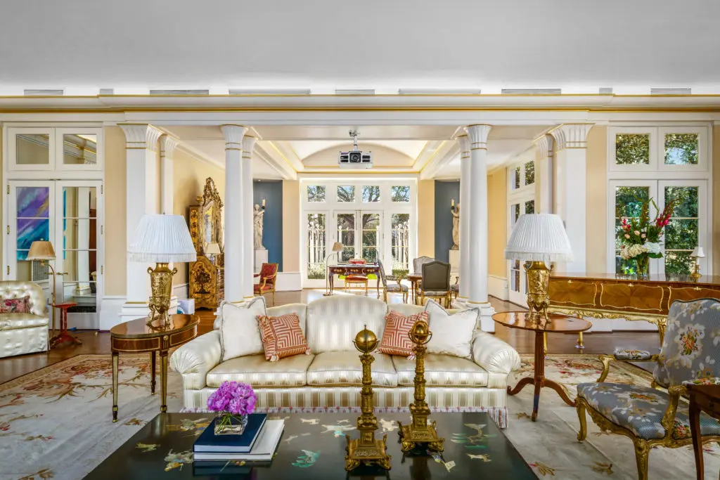 The living room of the Gerald Hines house in River Oaks features Venetian plastered walls and columns with Egyptian-inspired pilasters and an abundance of gilt trim. (Photo by Sonya Bertolino)