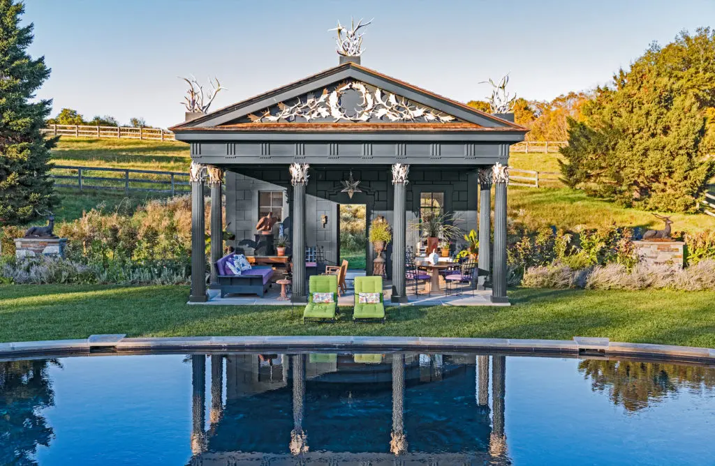 Pool house inspired by a rustic temple on the grounds of Arundel Castle in West Sussex, England.