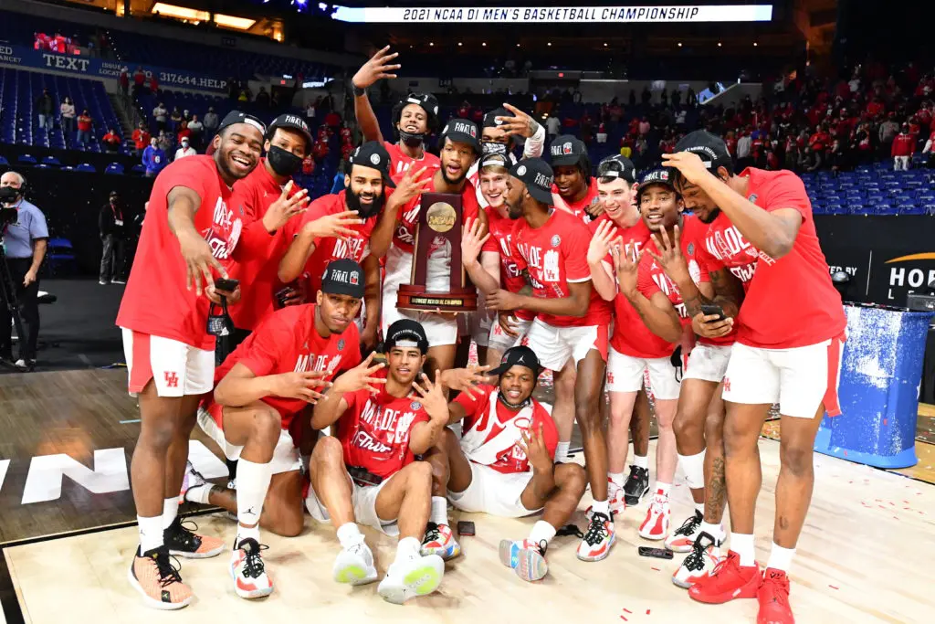 Flashing four fingers is the only way to celebrate a historic Final Four berth, Houston's first since 1984. (Photo by Brett Wilhelm/NCAA Photos via Getty Images)