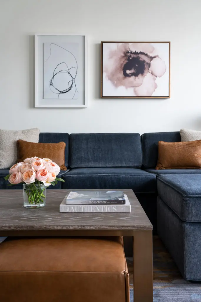 Natural oak, plush upholstery and artwork contribute to the new look in guest rooms at the Four Seasons Hotel in downtown Houston. (Photo by Four Seasons Hotel Houston)