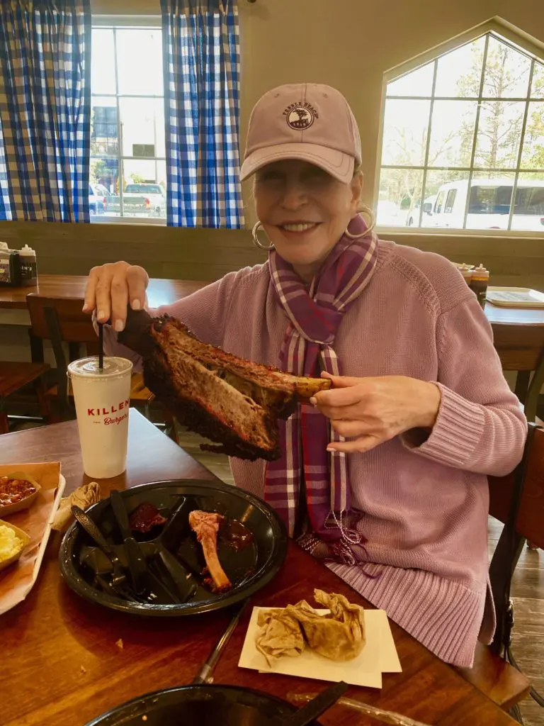 Shelby Hodge tries the massive, melt-in-your-mouth beef rib at Killen's Barbecue in The Woodlands. No, she could not finish it.