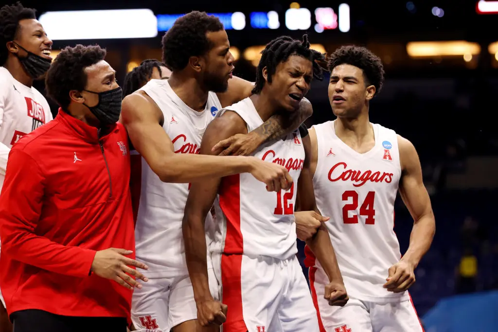 Tramon Mark (No. 12) came out of nowhere for the offensive rebound putback flick that won the game for Houston,  (Photo by Jamie Schwaberow/NCAA Photos via Getty Images)