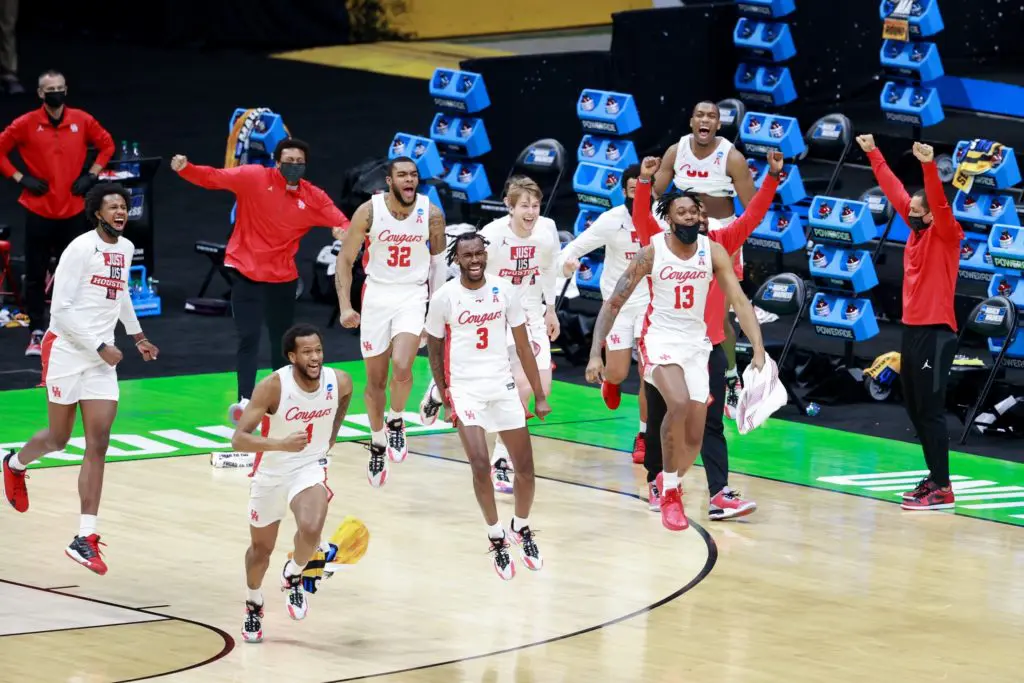 The Cougars started running around and celebrated after coming back to beat Rutgers. As usual, DeJon Jarreau (No. 3) was at the center of it. (Photo by Justin Tafoya/NCAA Photos via Getty Images)