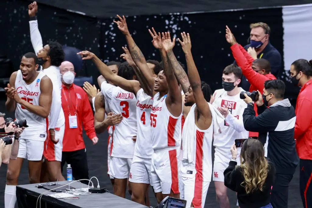 Houston's players treasured one of the most memorable wins in the basketball program's history. (Photo by Justin Tafoya/NCAA Photos via Getty Images)