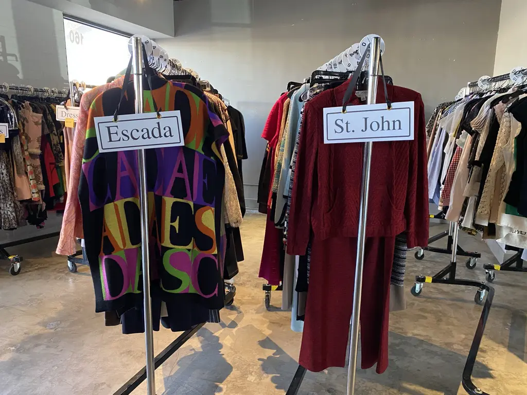 While items are being collected for the Salvation Army Women's Auxiliary 'Reflections on Style' fundraiser, they are sorted at the Chic Boutique Showroom. (Photo by Shelby Hodge)