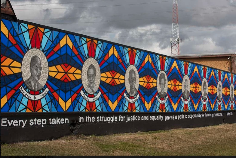 Reginald Adams' mural "Sacred Paths,"  located in the Third Ward at Columbia Tap Trail, depicts eight African-American activists. (Photo by Reginald Adams)