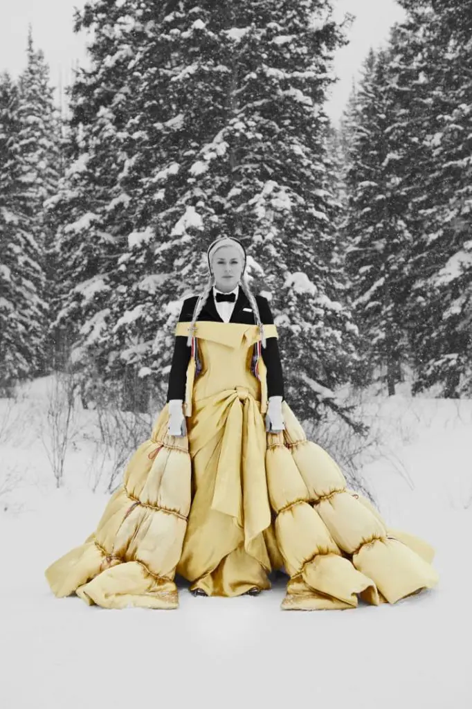 Lindsay Vonn was the star of a video featuring the fall 2021 Thom Browne collection. She wore a gold quilted down dress draped over a man's suit. (Photo courtesy of Thom Browne)