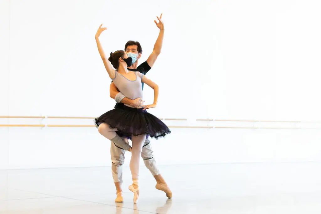 Houston Ballet First Soloist Mónica Gómez and Principal Charles-Louis Yoshiyama rehearsing Ben Stevenson’s Don Quixote.   (Photo by Lawrence Elizabeth Knox)