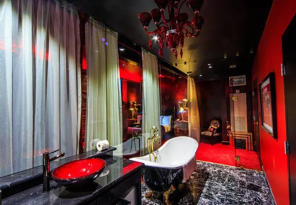 David Wyant's penchant for quirky design can be seen in the bath of the Lucifer Suite in The Saint Hotel New Orleans.