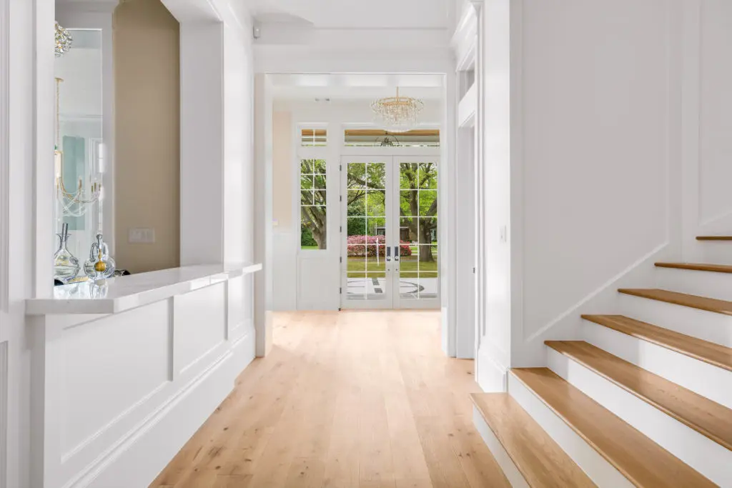 Wide-plank light wood floors are featured throughout 4027 University Boulevard.(Photo courtesy of Compass Real Estate) 