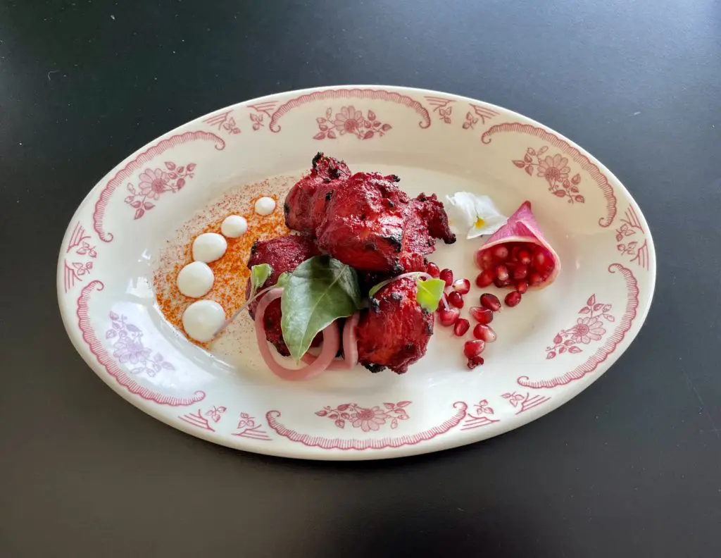 Dishes at Âme include Anari Chicken, Cashew Chicken Tikka, and more. (Courtesy of Ame)