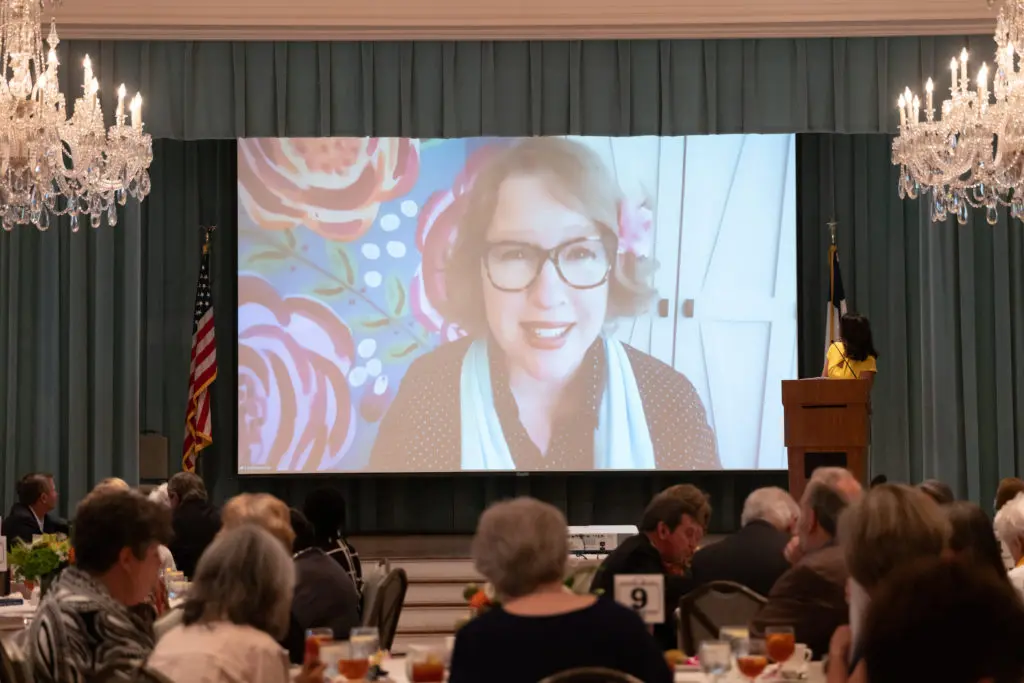 New York Times best-selling author Katherine Center addresses the Houston Hospice Butterfly Luncheon digitally from her Houston home.  (Photo by Daniel Ortiz)