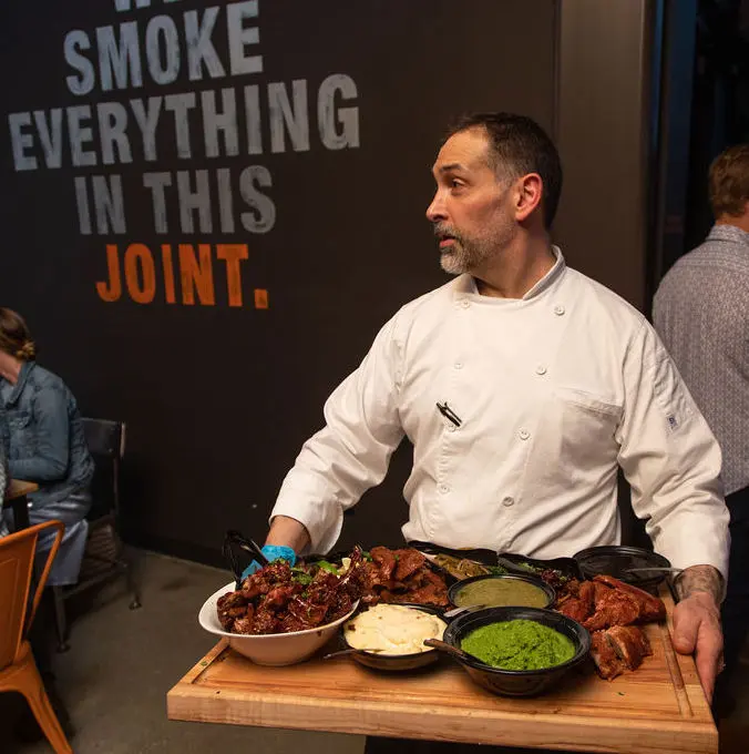 Woodshed Smokehouse chef de cuisine Brian Mottola brings talent to the smokehouse in Houston's Levy Park. (Photo by Leah Wilson)