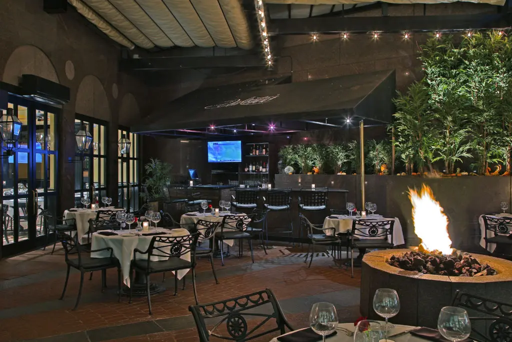 Dakota's Steakhouse was built underground for a reason. It features a fire pit, waterfall, and greenery. (Courtesy of Dakota's Steakhouse and Kevin Marple)