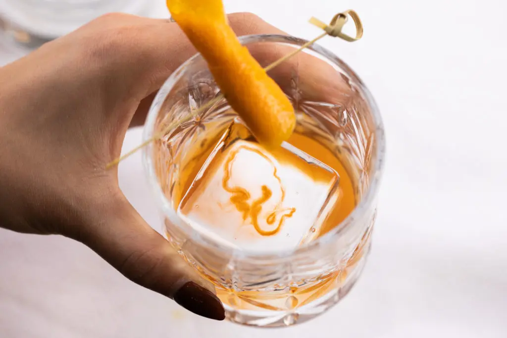 The Viejo Fashion at Âme is a twist on the classic Old Fashioned — made with tequila, grapefruit syrup, and orange bitters. (Photo by Kathy Tran)