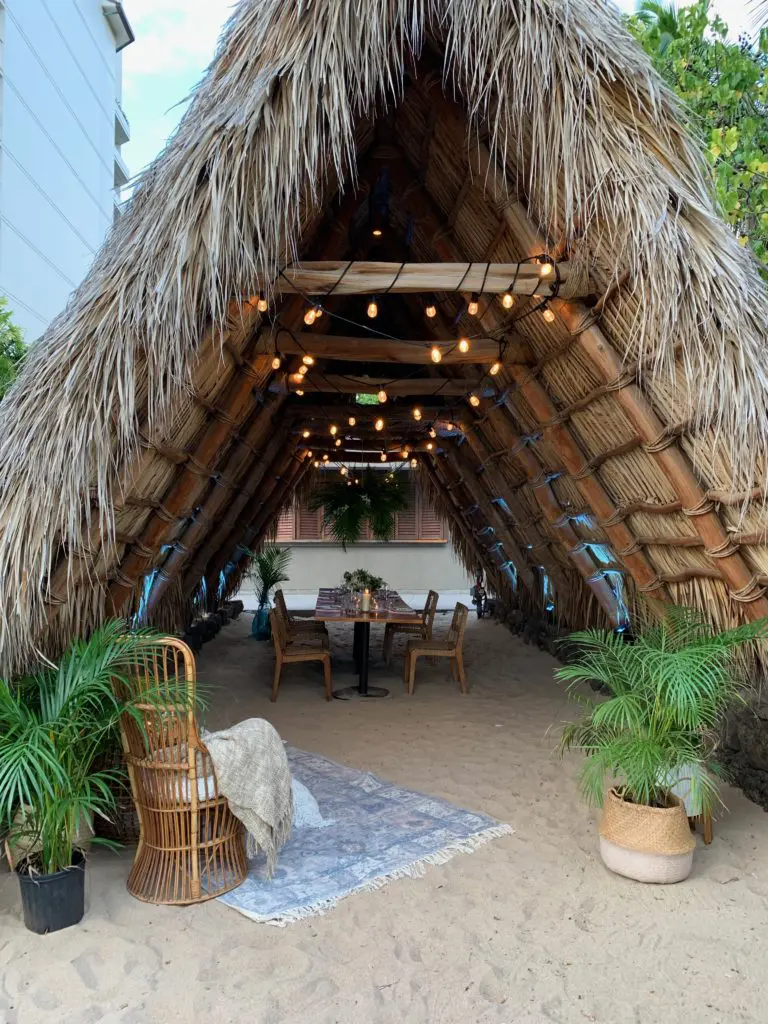 The Hale Wa'a at Mina's Fish House turns beach dining into the most elegant affair. (Photo by Tarra Gaines)