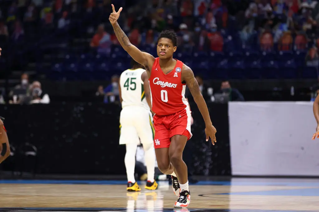 Marcus Sasser kept hitting threes early, desperately trying to keep Houston closer to Baylor. (Photo by Jamie Schwaberow/NCAA Photos via Getty Images)