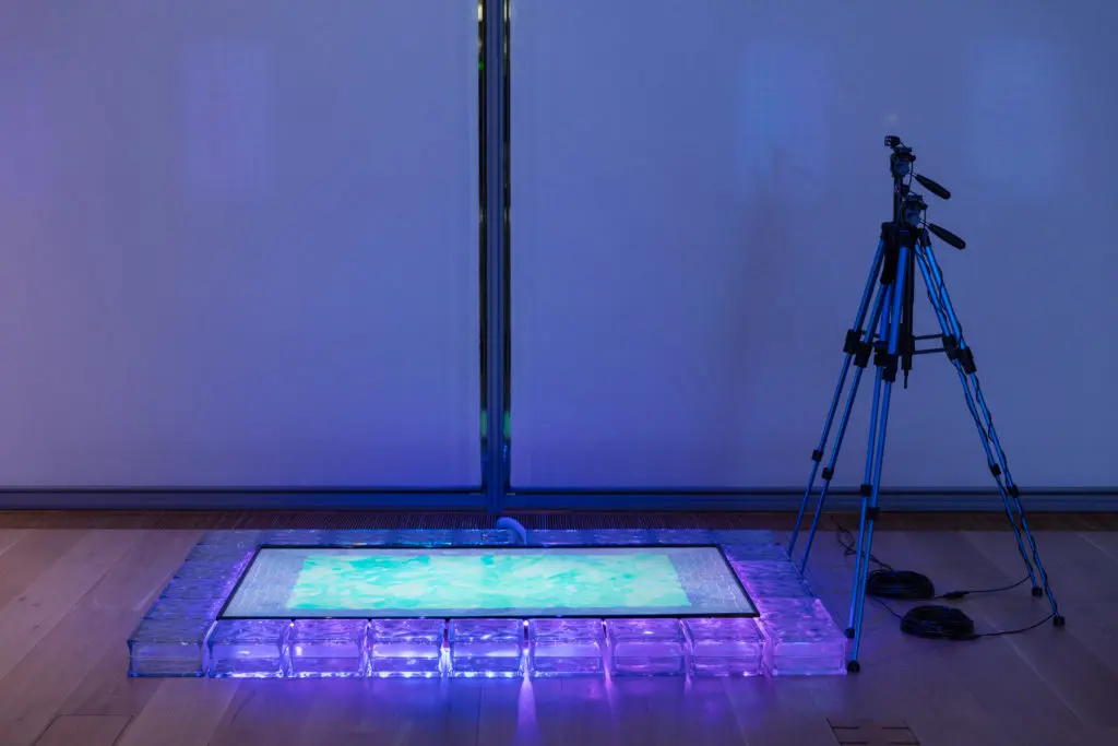 "Reflect" resembles a reflection pool for quiet thought and meditation.