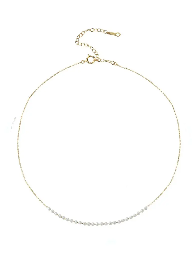 Ylang 23, has a stylish assortment of Mizuki jewelry like this necklace with centered baby fresh water pearls on an adjustable gold chain.