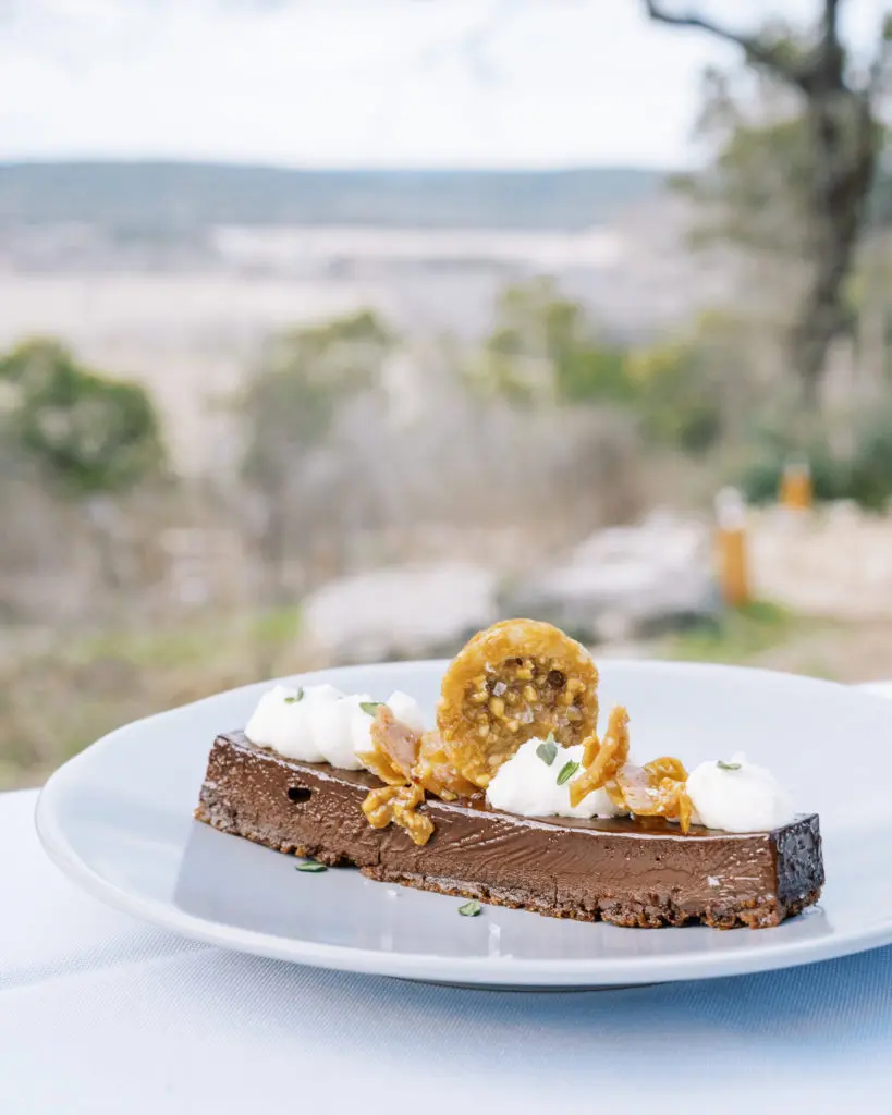 The sixth course: chocolate hazelnut tart. (courtesy of Collective Retreats)