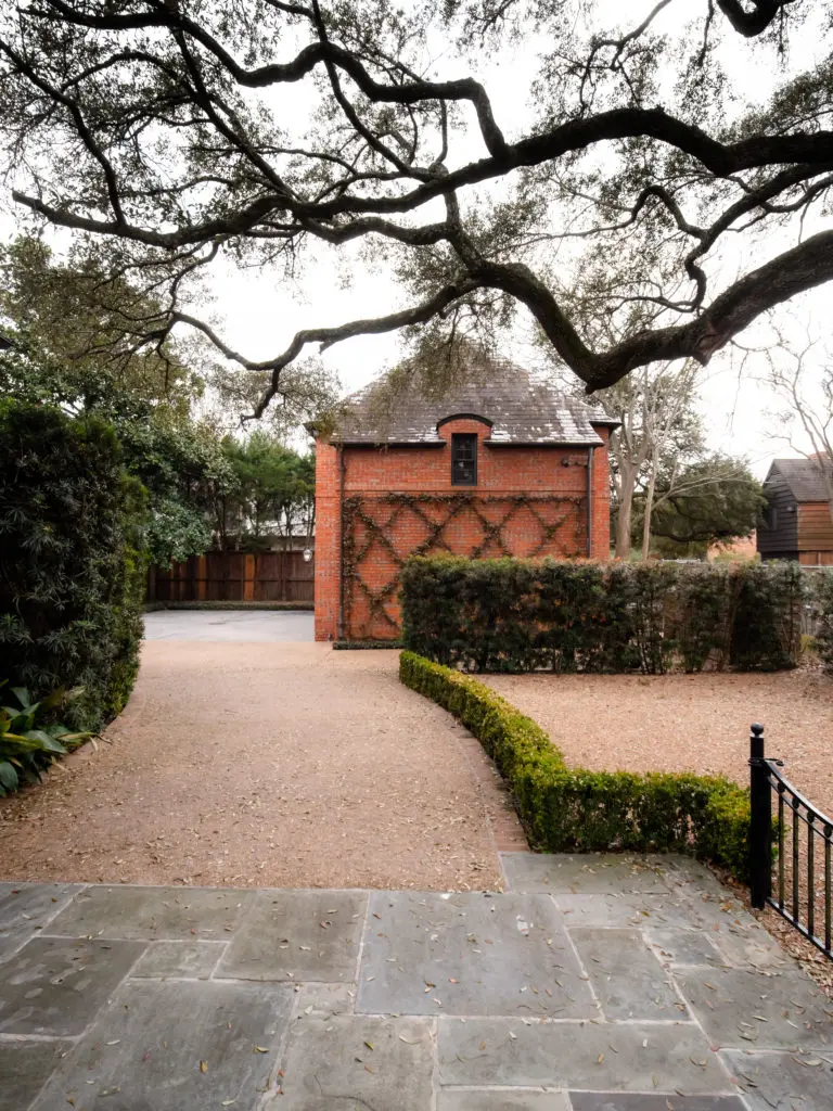 The three-car garage, which contains an elegant guesthouse (844 sq.ft.) above with full bath, kitchen, living and sleeping spaces at 1317 North Boulevard in Houston's Broadacres neighborhood.  (Photo by Jonathan Calvert)