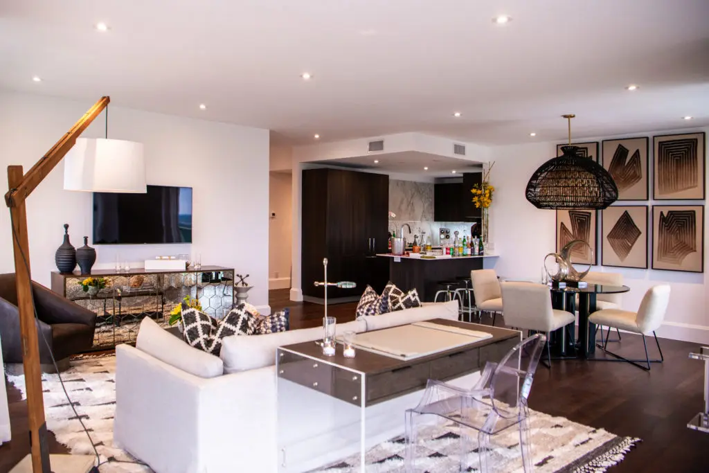 Guests tour newly remodeled condos, decorated by Ladco, at The Parklane near Hermann Park.
