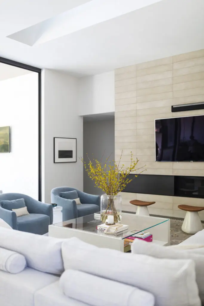 In the living area, leather-and-ceramic stools by Christophe Delcourt. Walter Knoll sofa. Hiroshi Sugimoto photograph, sourced by Anne Bruder from Marian Goodman Gallery, NY. (Photo by Addison Jones)